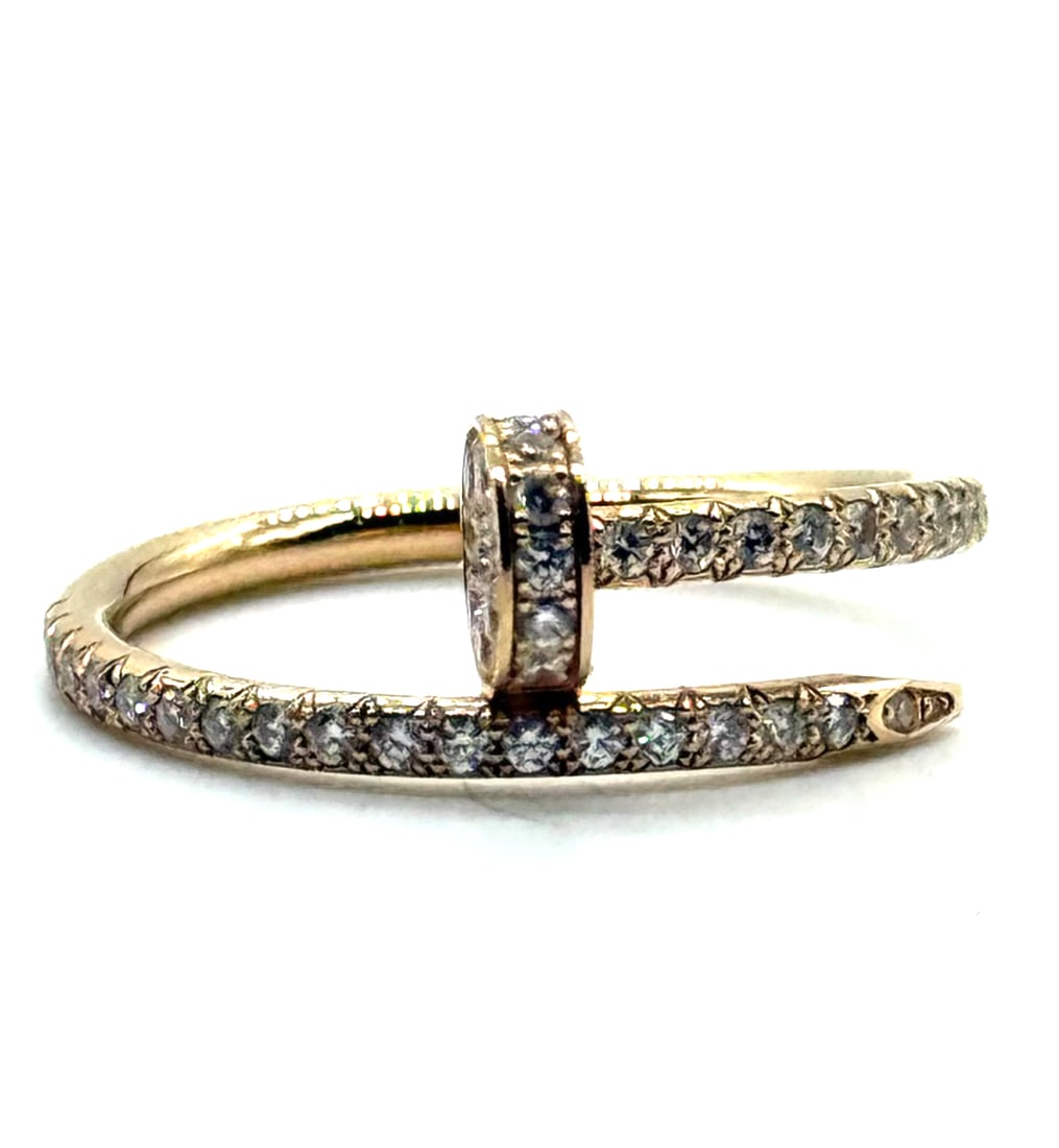 Juste Un clou Cartier Diamond Ring 18kt Rose Gold: Juste Un clou Cartier Diamond Ring 18kt Rose GoldThe Juste Un clou Cartier Diamond Ring in 18kt Rose Gold is a luxurious piece of fine jewelry featuring 22 natural white diamonds in a pavé setting. T