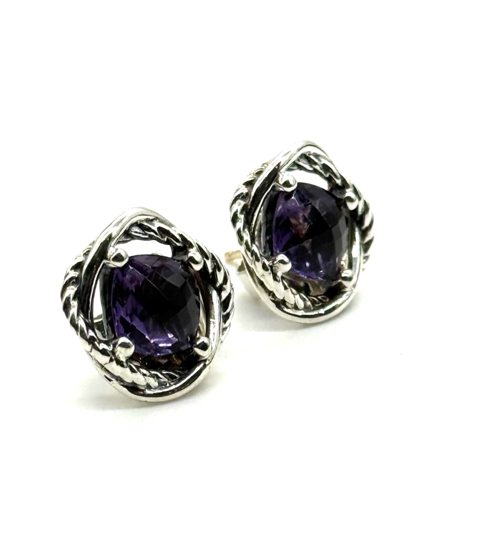 David Yurman 925 Sterling Silver 7mm Amethyst Faceted Infinity Earrings: The David Yurman 925 Sterling Silver 7mm Amethyst Infinity Earrings are a luxurious and elegant pair of fine jewelry designed for women. Featuring a square-shaped amethyst stone in a rich purple color