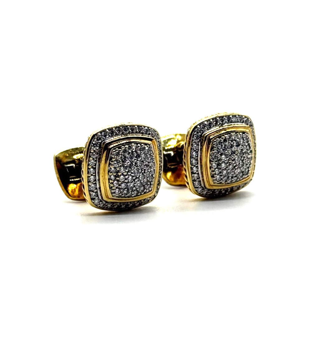 David Yurman 18kt Yellow Gold Pave Diamond Cufflinks: The David Yurman 18kt Yellow Gold Pave Diamond Cufflinks are luxurious accessories designed for men. Crafted with 18k yellow gold and featuring a sparkling white diamond in the center, these cufflinks
