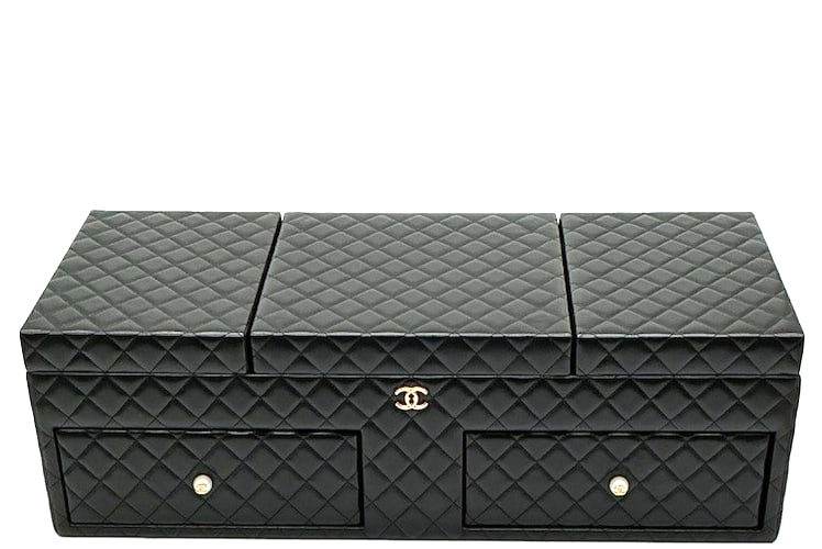 Rare Chanel Lamb skin Quilted Jewelry Trunk extra large: This rare Chanel Lamb skin Quilted Jewelry Trunk is a luxurious and stylish accessory for women. Featuring a double turn lock closure , this extra large trunk is made from quilted lamb skin with a bla