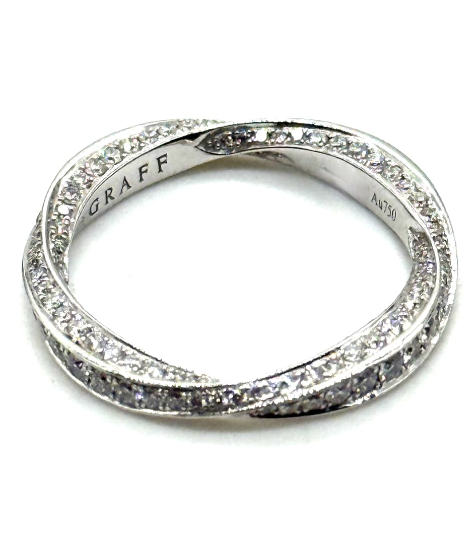 Graff Pave Spiral Diamond Band 18kt White Gold 2.2mm: The Graff Pave Spiral Diamond Band in 18kt White Gold is a stunning piece of fine jewelry. The natural white diamonds set in the pavé style on white gold create a luxurious and elegant look. With a b