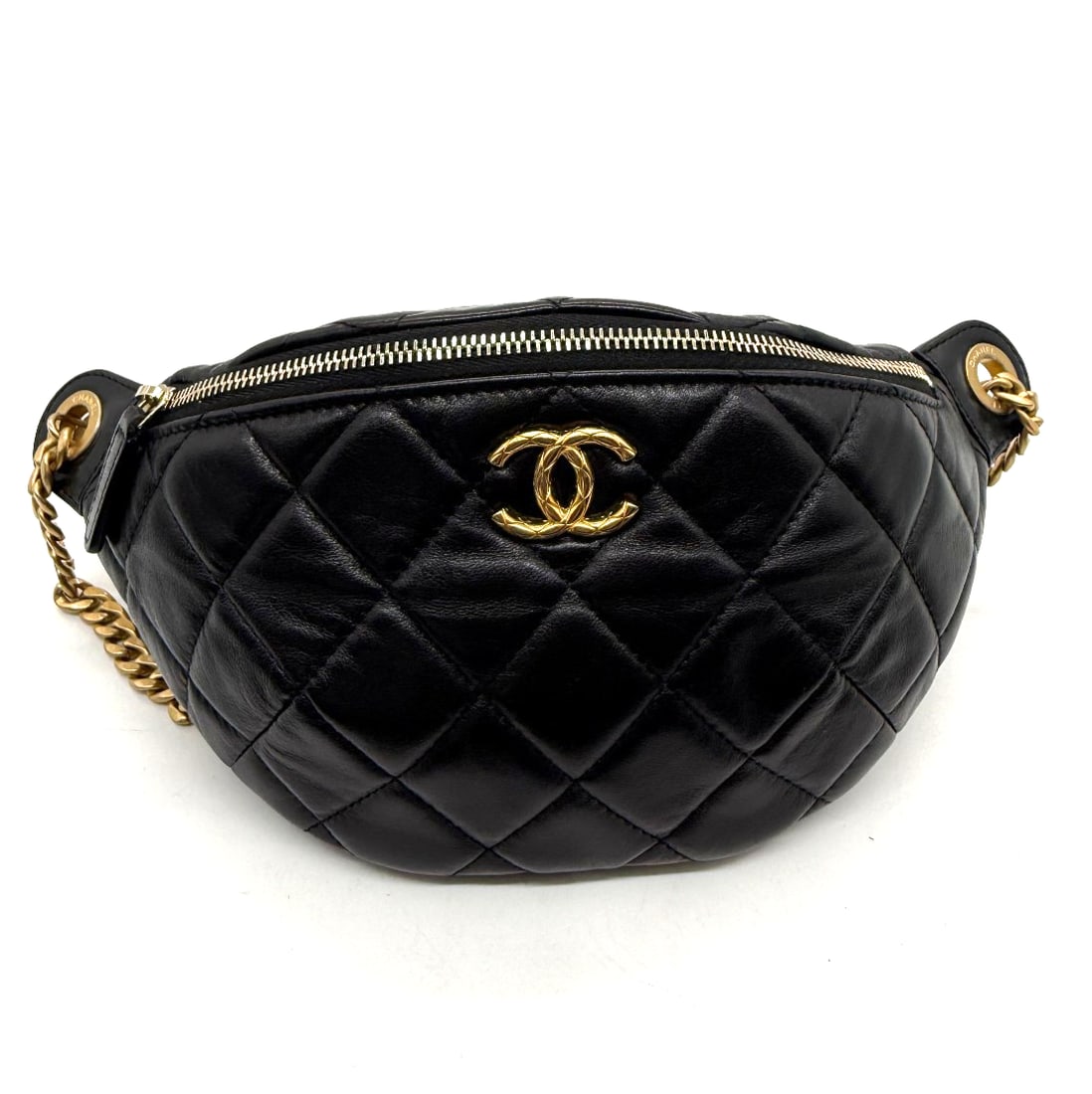 Chanel New Black Waist Belt Bag / Bumbag With Adjustable Antique Gold Chain: The Chanel Black Waist Belt Bag is a stylish and chic accessory designed for women. Made from leather with an adjustable antique gold chain strap, this belt bag gives a touch of luxury to any outfit.