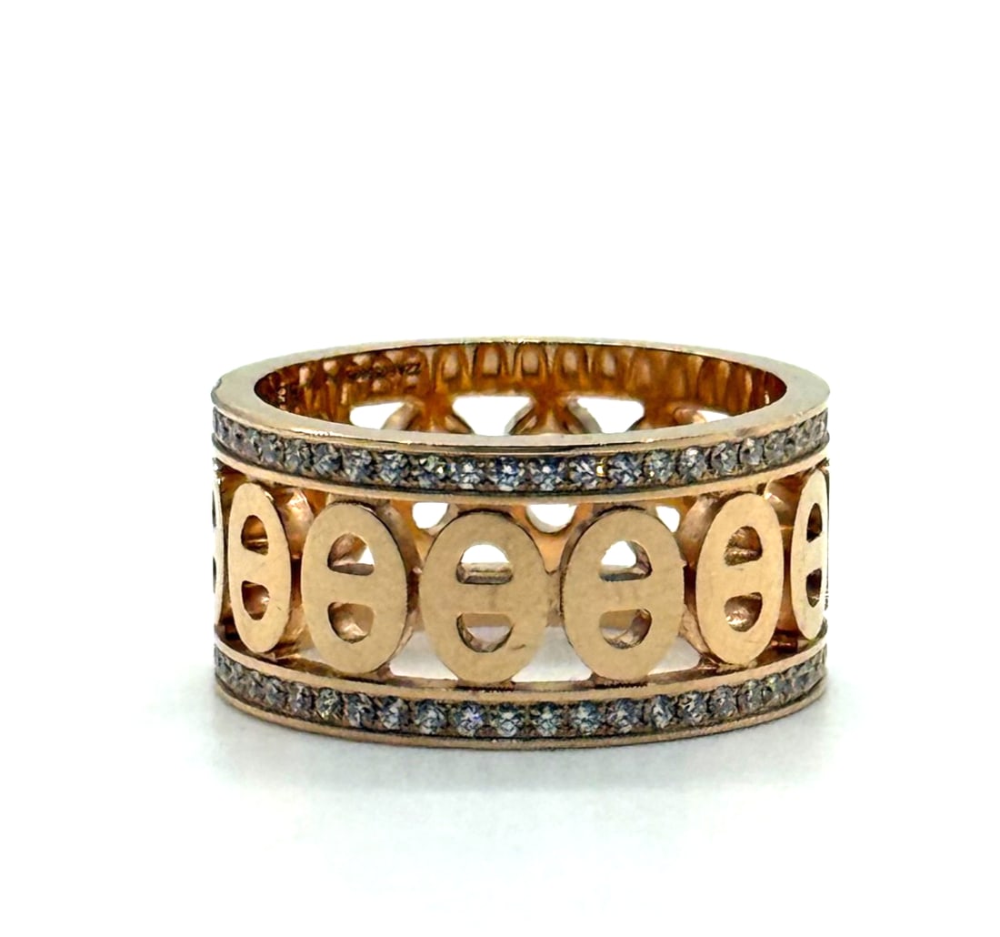 Hermes 18K Rose Gold Diamond PM Chaine d'Ancre Divine Ring: The Hermes 18K Rose Gold Diamond PM Chaine d'Ancre Divine Ring is a luxurious piece of fine jewelry that exudes elegance and sophistication. Crafted from high-quality 18k rose gold, this ring features