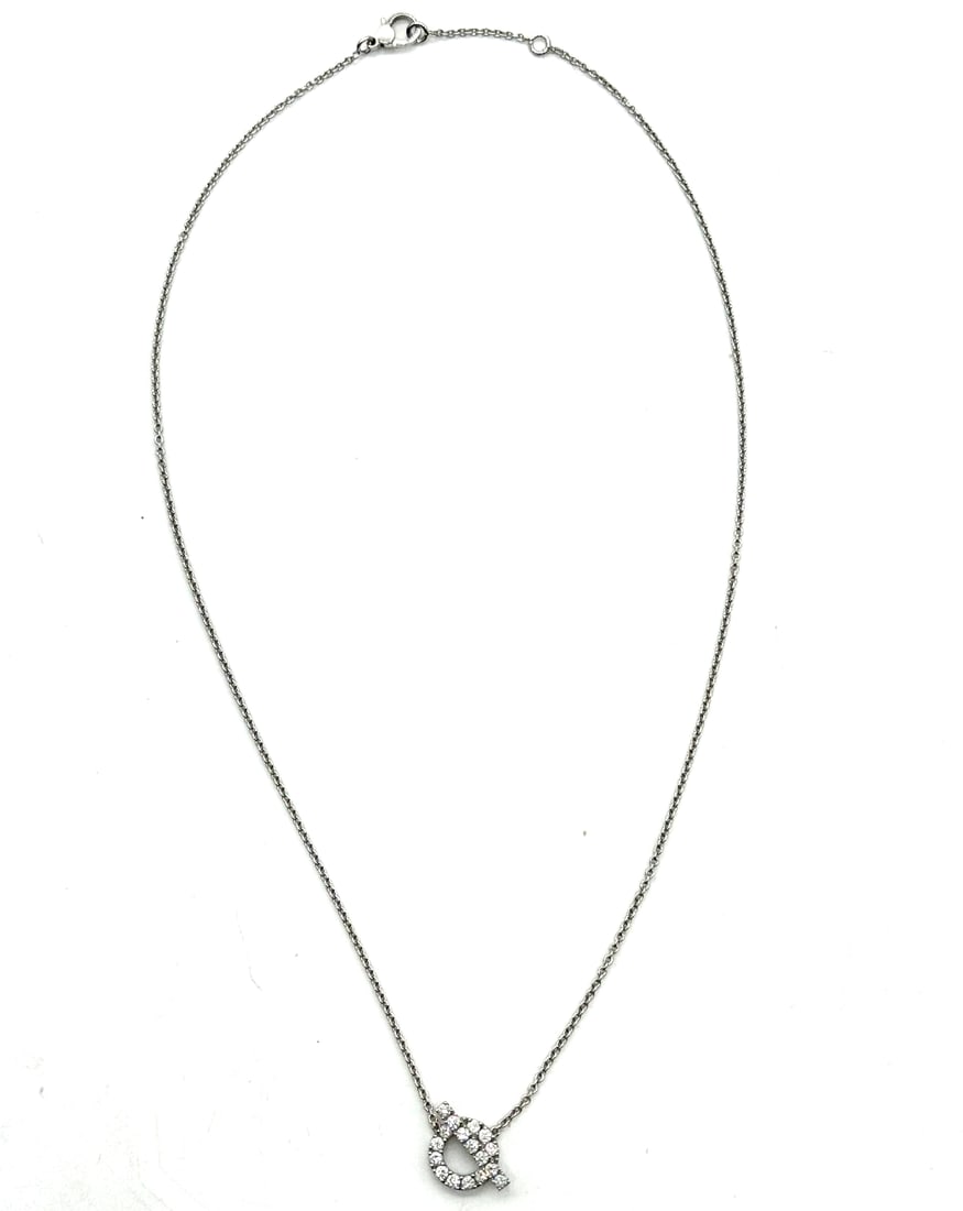 Hermes Finesse Diamond Pendant 18kt White Gold Necklace: The Hermes Finesse Diamond Pendant is a luxurious and elegant piece of fine jewelry crafted from 18kt white gold. Featuring a stunning white diamond as the main stone, this pendant exudes sophisticati