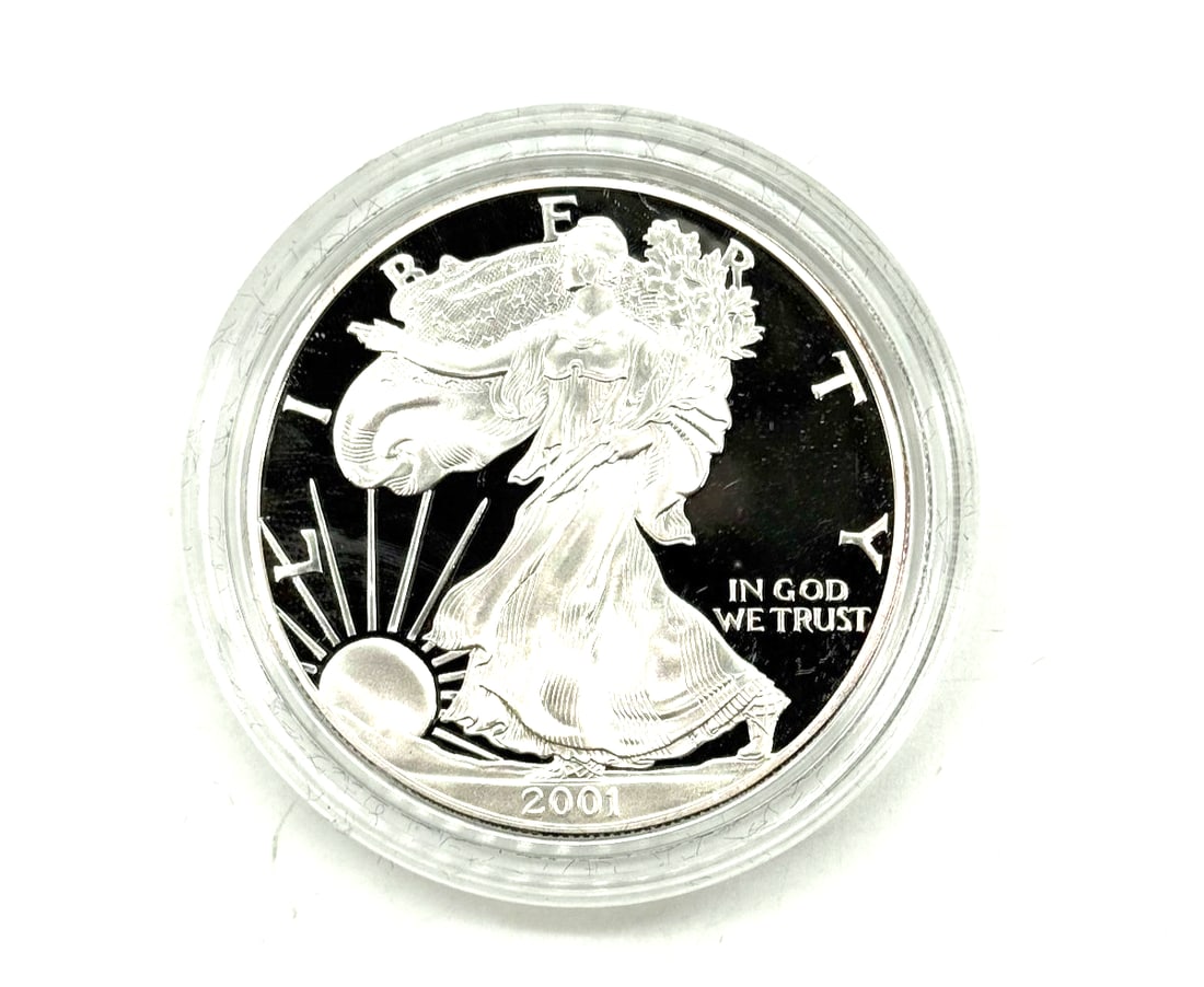 2001 American Silver Eagle 1 oz .999 Fine Silver Bullion Coin: The 2001 American Silver Eagle is a highly sought-after bullion coin made of .999 fine silver. This coin features the iconic American Eagle design and contains 1 oz of silver per unit. As a popular in
