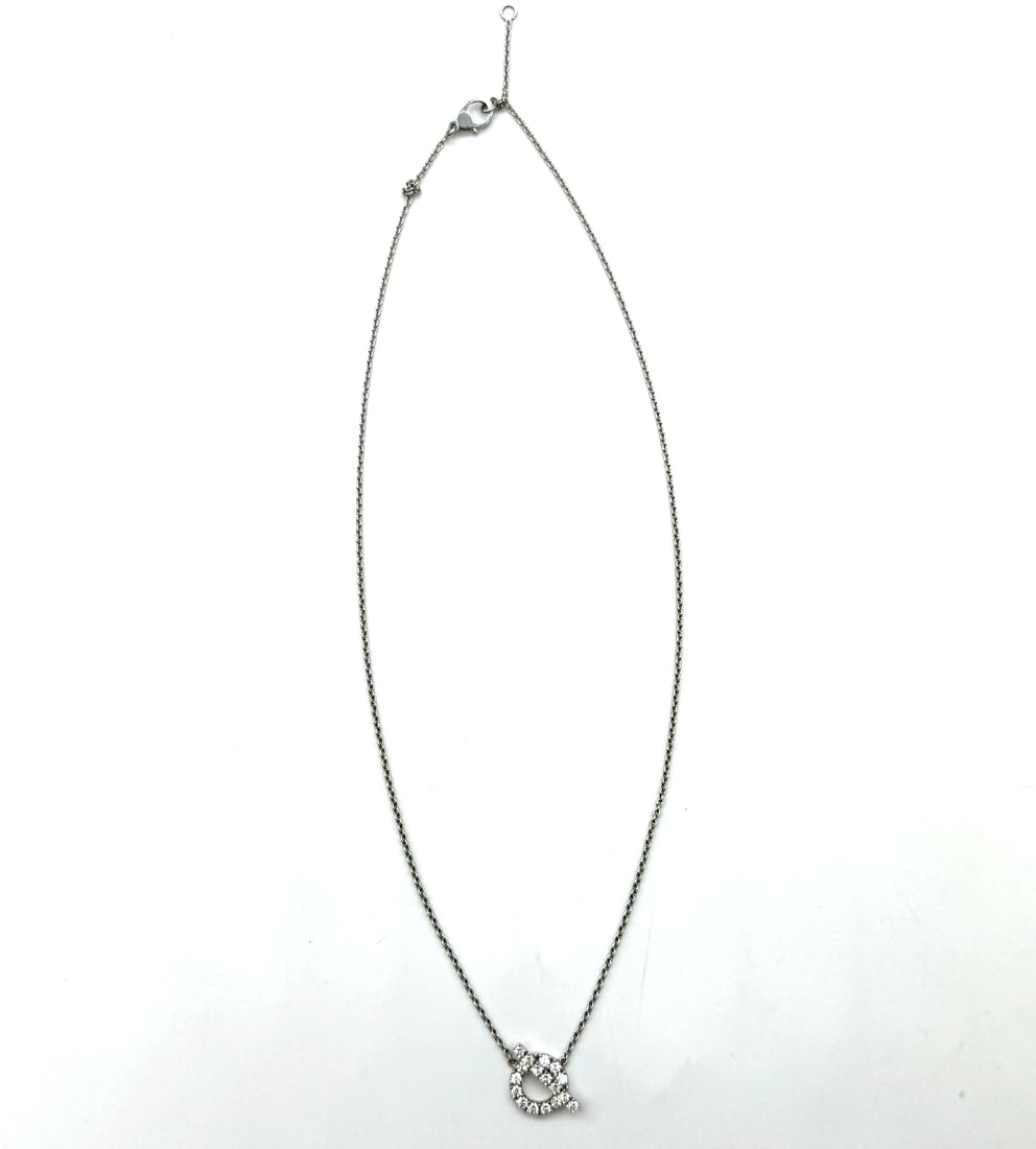Hermes Finesse Pendant Necklace 18K White Gold and Diamonds: The Hermes Finesse Pendant Necklace in 18K White Gold and Diamonds is a luxurious and elegant piece of fine jewelry. This necklace features a stunning pendant design with a chain style, showcasing the