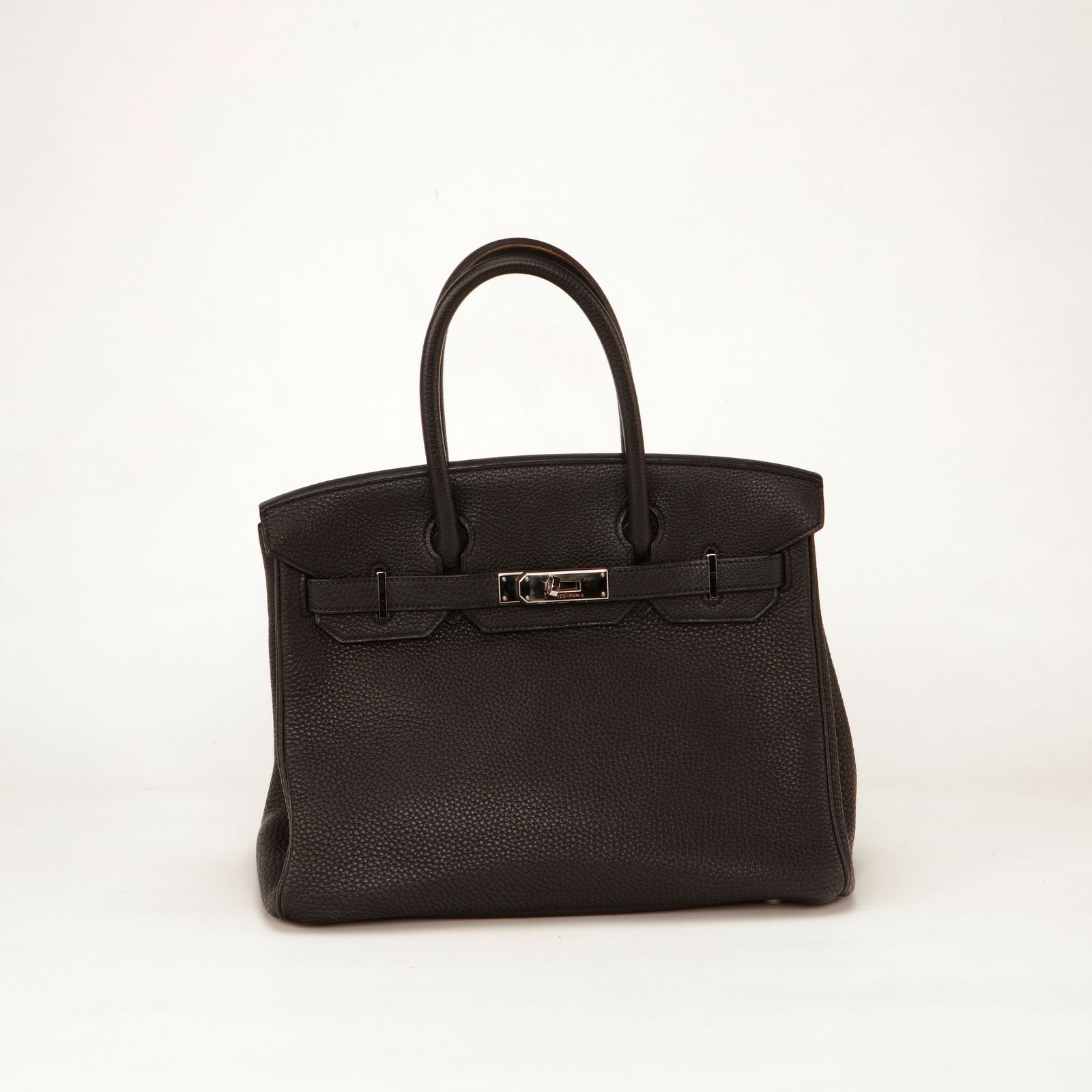 Hermès Birkin 30 Togo Leather Handbag – Dark Brown with Palladium Hardware: Authentic Hermès Birkin 30 crafted in luxurious grained Togo leather in a rich dark brown tone. Featuring the iconic front flap with signature sangles and turn-lock closure accented by elegant pallad