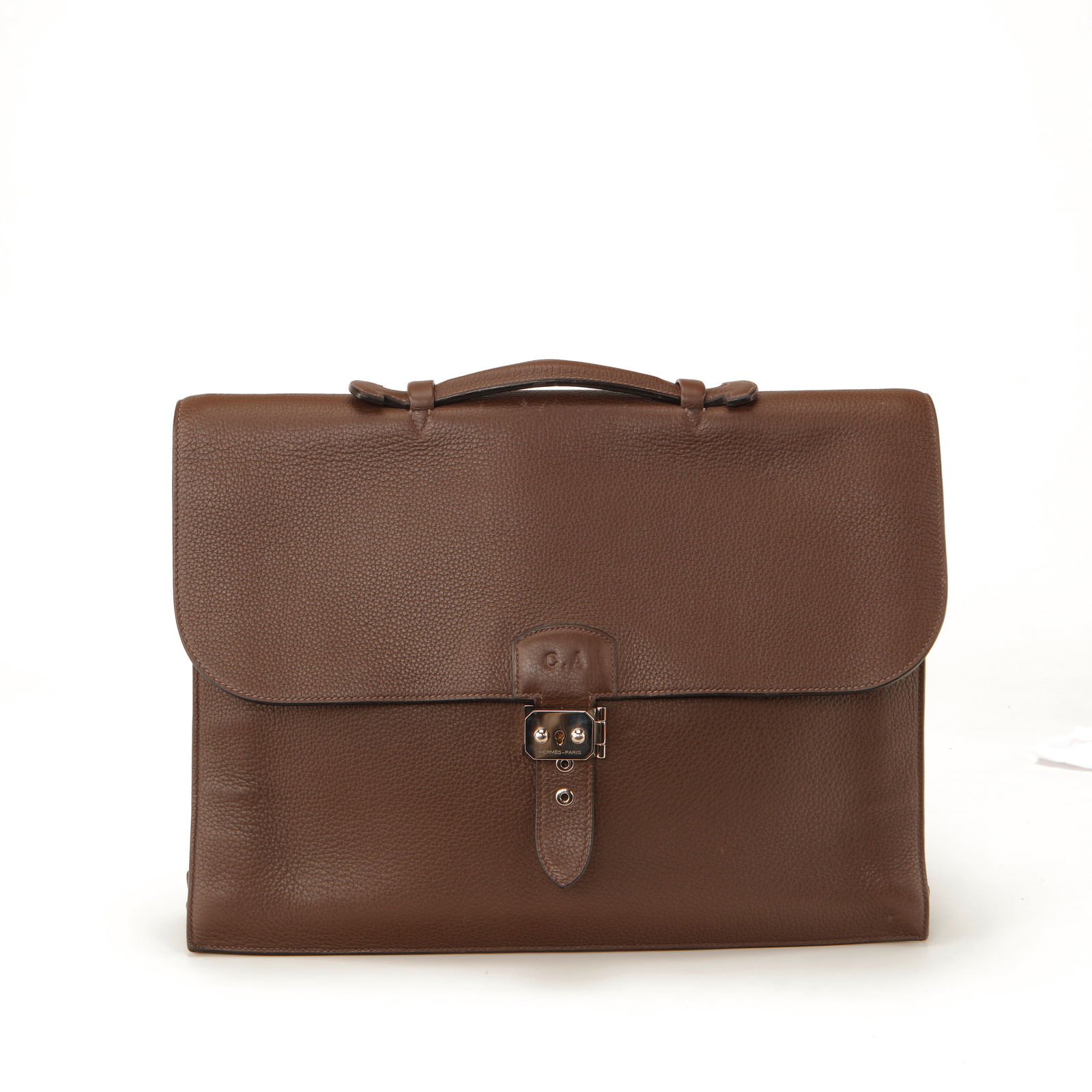 Hermès Sac à Dépêches 38 Clemence Leather Briefcase – Brown with Palladium Hardware: Authentic Hermès Sac à Dépêches 38 crafted in supple grained Clemence leather in a rich brown tone. This iconic structured briefcase features a classic top handle, elegant front flap, and secure p