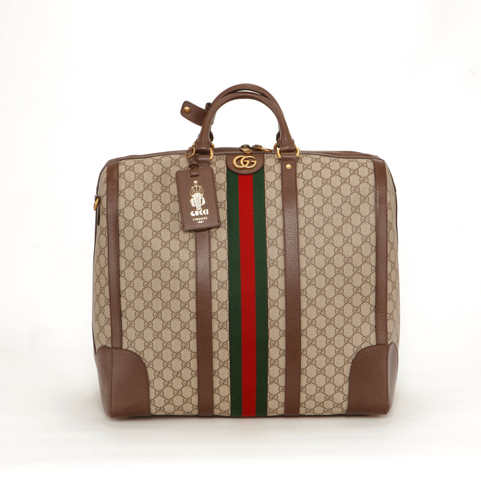 Gucci GG Supreme Web Duffle Bag – Beige/Ebony with Brown Leather Trim: Authentic Gucci duffle bag crafted in signature GG Supreme canvas with brown leather trim and gold-tone hardware. Featuring the iconic green and red Web stripe down the center, double top handles, and