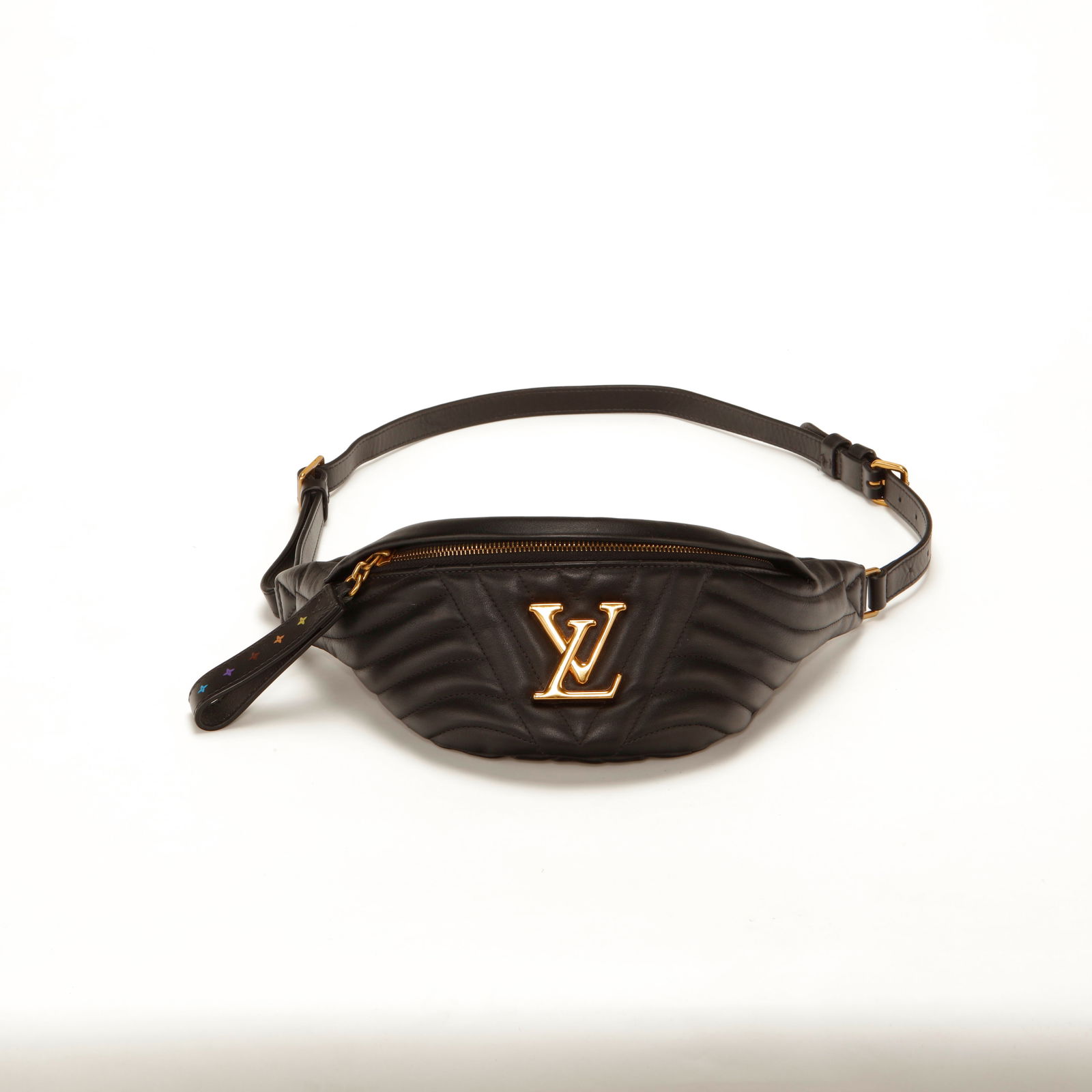 Louis Vuitton New Wave Bumbag – Black Quilted Leather: Authentic Louis Vuitton New Wave Bumbag crafted in smooth black quilted calfskin leather with signature wave pattern. Features oversized gold-tone LV logo hardware at the front, top zip closure, and