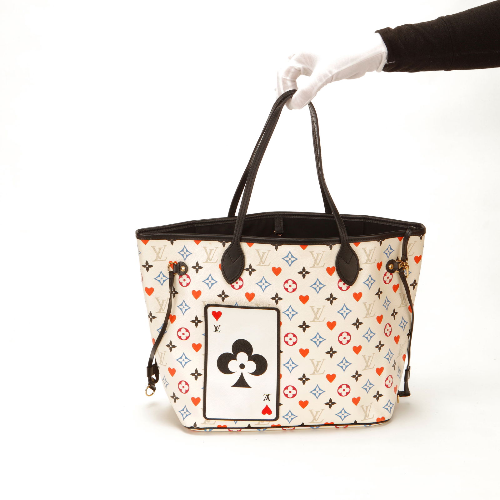 Louis Vuitton Neverfull MM Game On Monogram Canvas Tote: Louis Vuitton Neverfull MM from the limited edition Game On collection, crafted in Monogram canvas with multicolor heart and card-inspired motifs. Features black leather trim, slim shoulder straps, si