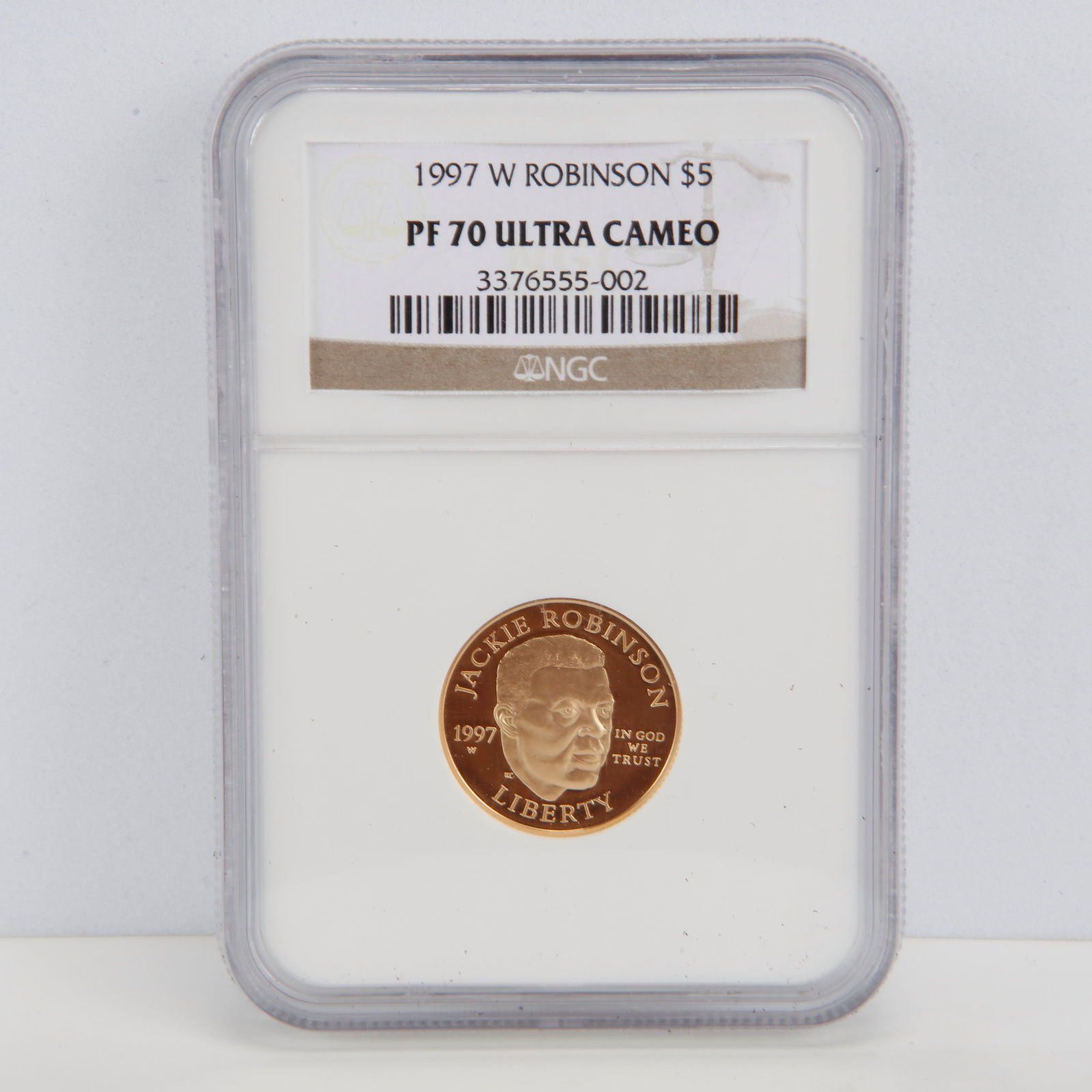 Certified Commemorative $5 Gold 1997-W Robinson PF70 NGC: The Certified Commemorative $5 Gold 1997-W Robinson PF70 NGC stands as a beautiful and meaningful tribute to one of America's most iconic sports figures, Jackie Robinson. Struck by the West Point Mint