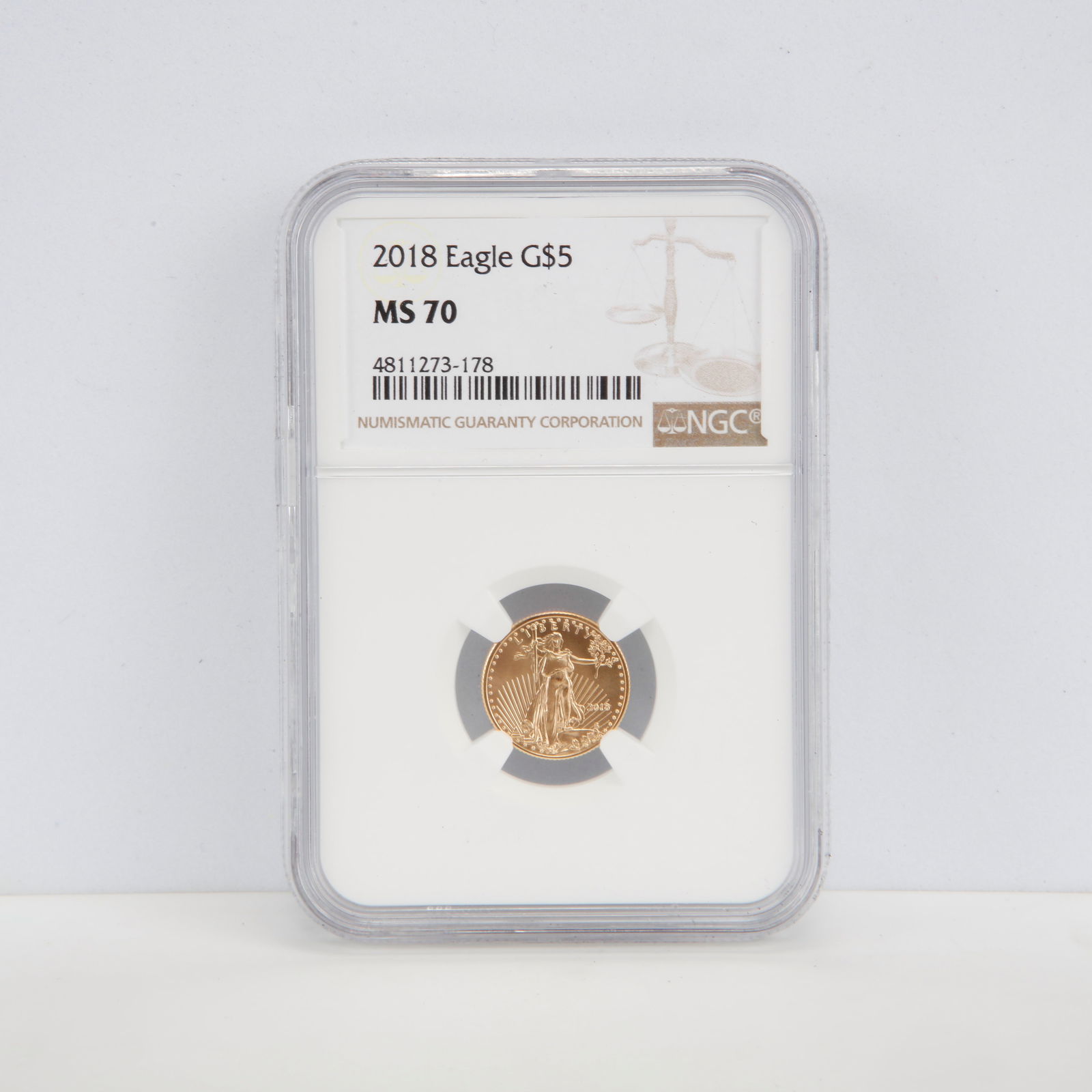 2018 $5 American Gold Eagle – NGC MS70 – 1/10 oz Gold: Offered here is a 2018 $5 American Gold Eagle, struck in 22-karat gold and containing 1/10 troy ounce of pure gold (.9167 fine). This coin has been certified MS70 by NGC, representing a flawless Mint