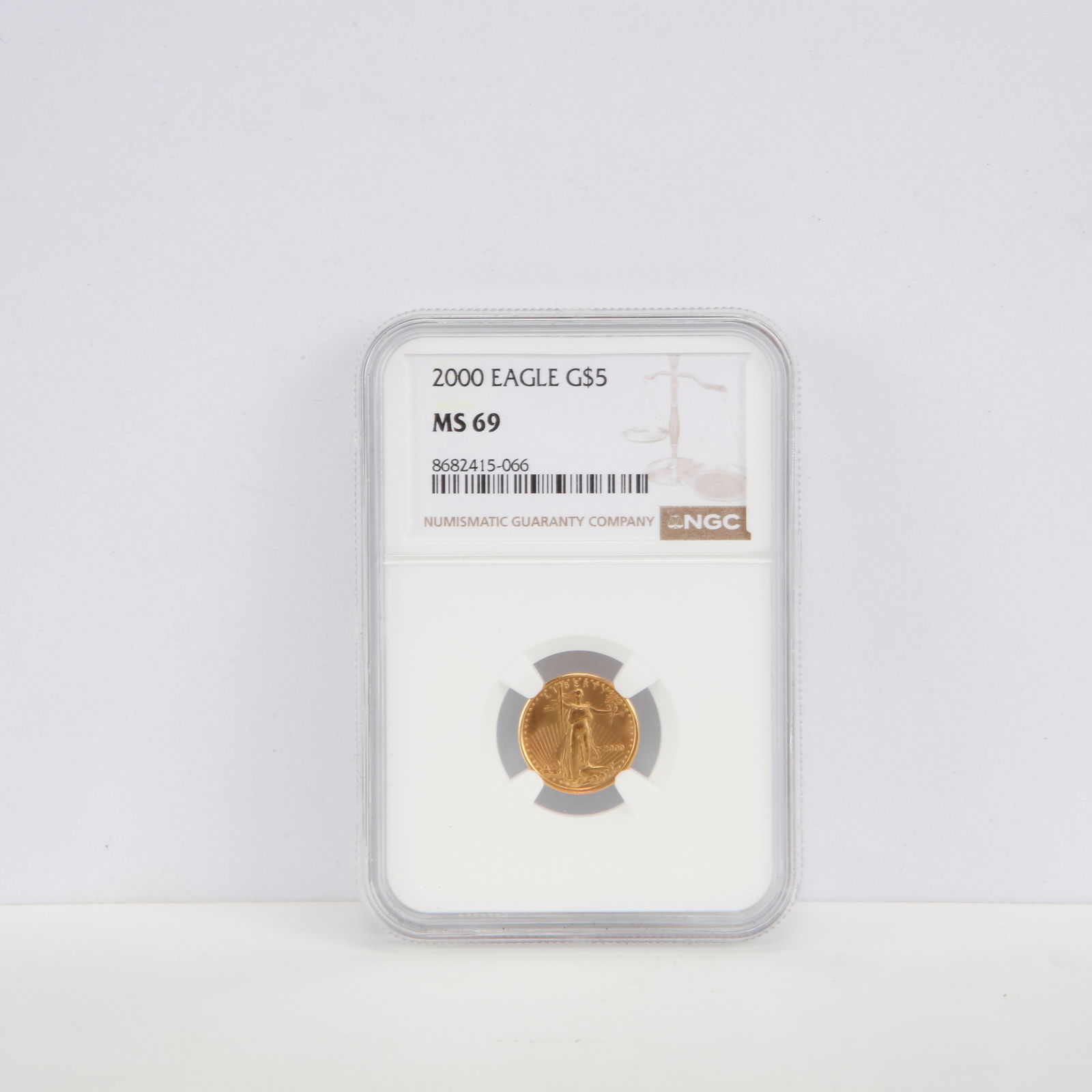2000 $5 American Gold Eagle – NGC MS69 – 1/10 oz Gold: Offered here is a 2000 $5 American Gold Eagle, struck in 22-karat gold and containing 1/10 troy ounce of pure gold (.9167 fine). This coin has been certified MS69 by NGC, indicating a superb near-perf