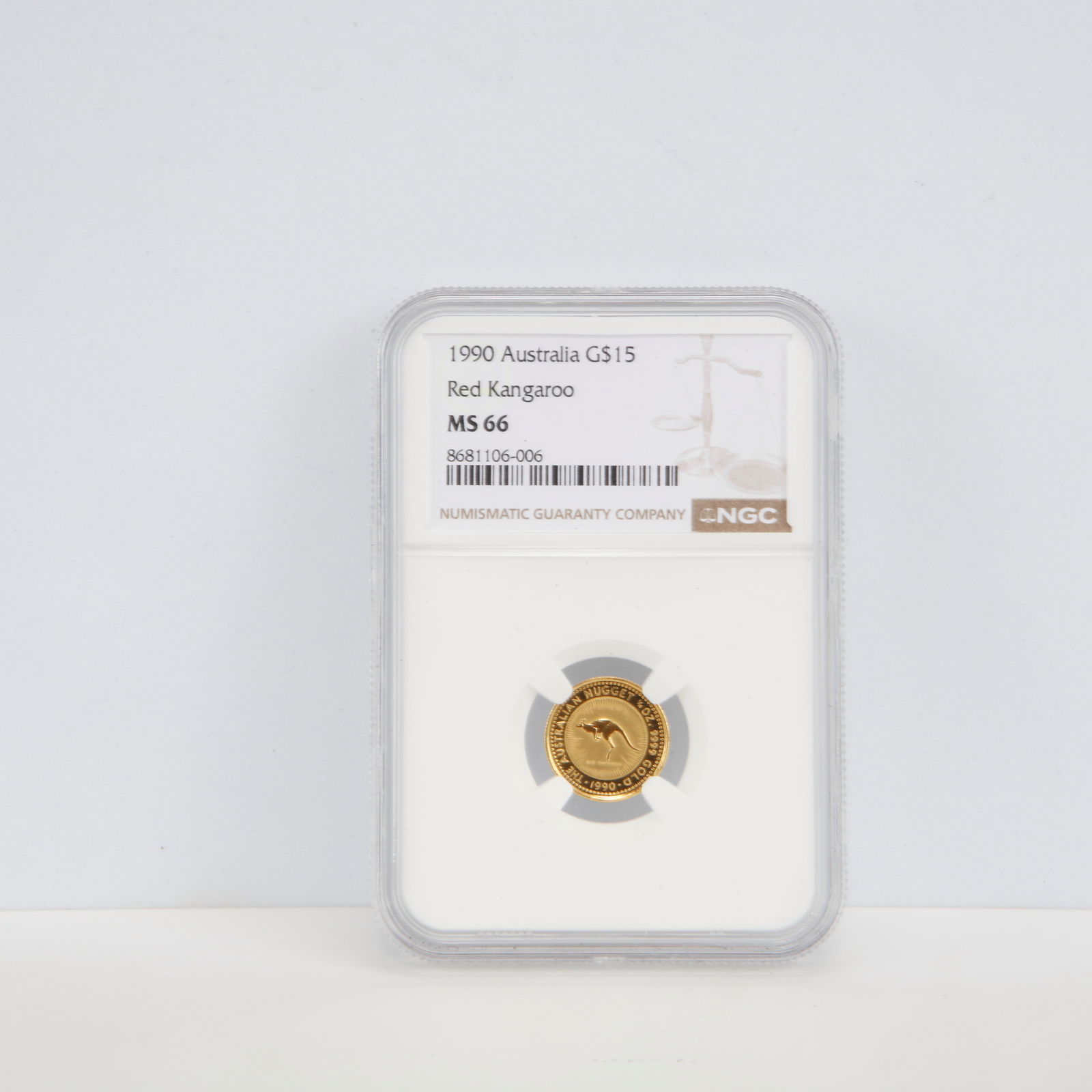 1990 Australia $15 Gold Kangaroo – NGC MS66 – 1/10 oz Gold: Offered here is a 1990 Australia $15 Gold Kangaroo (Red Kangaroo), struck in fine gold and containing 1/10 troy ounce of pure gold. This coin has been certified MS66 by NGC, indicating a solid Mint St