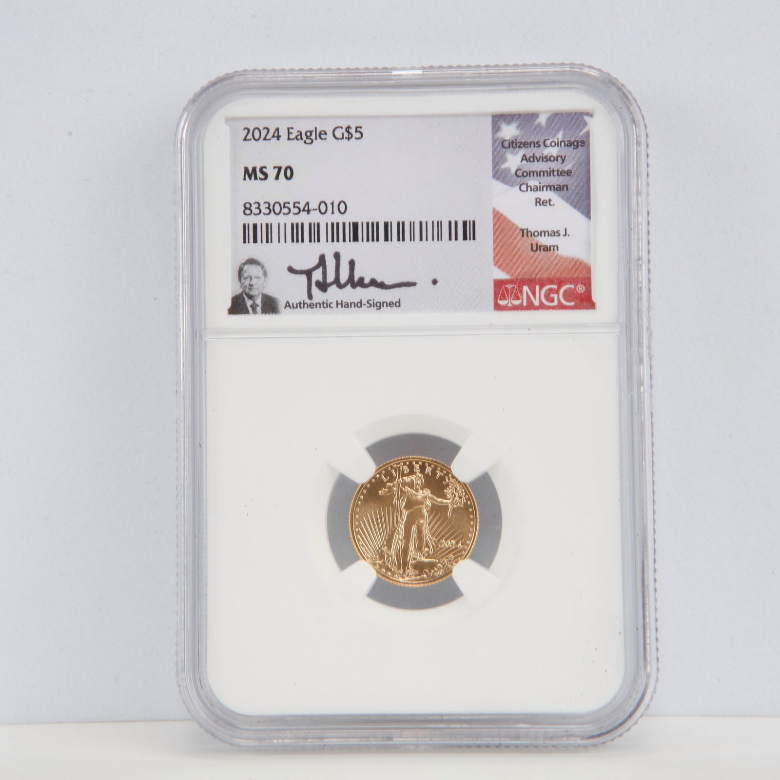 2024 $5 American Gold Eagle – NGC MS70 – Thomas J. Uram Signed Label – 1/10 oz Gold: Offered here is a 2024 $5 American Gold Eagle graded a perfect MS70 by NGC and presented with an authentic hand-signed label by Thomas J. Uram, former Chairman of the Citizens Coinage Advisory Committ