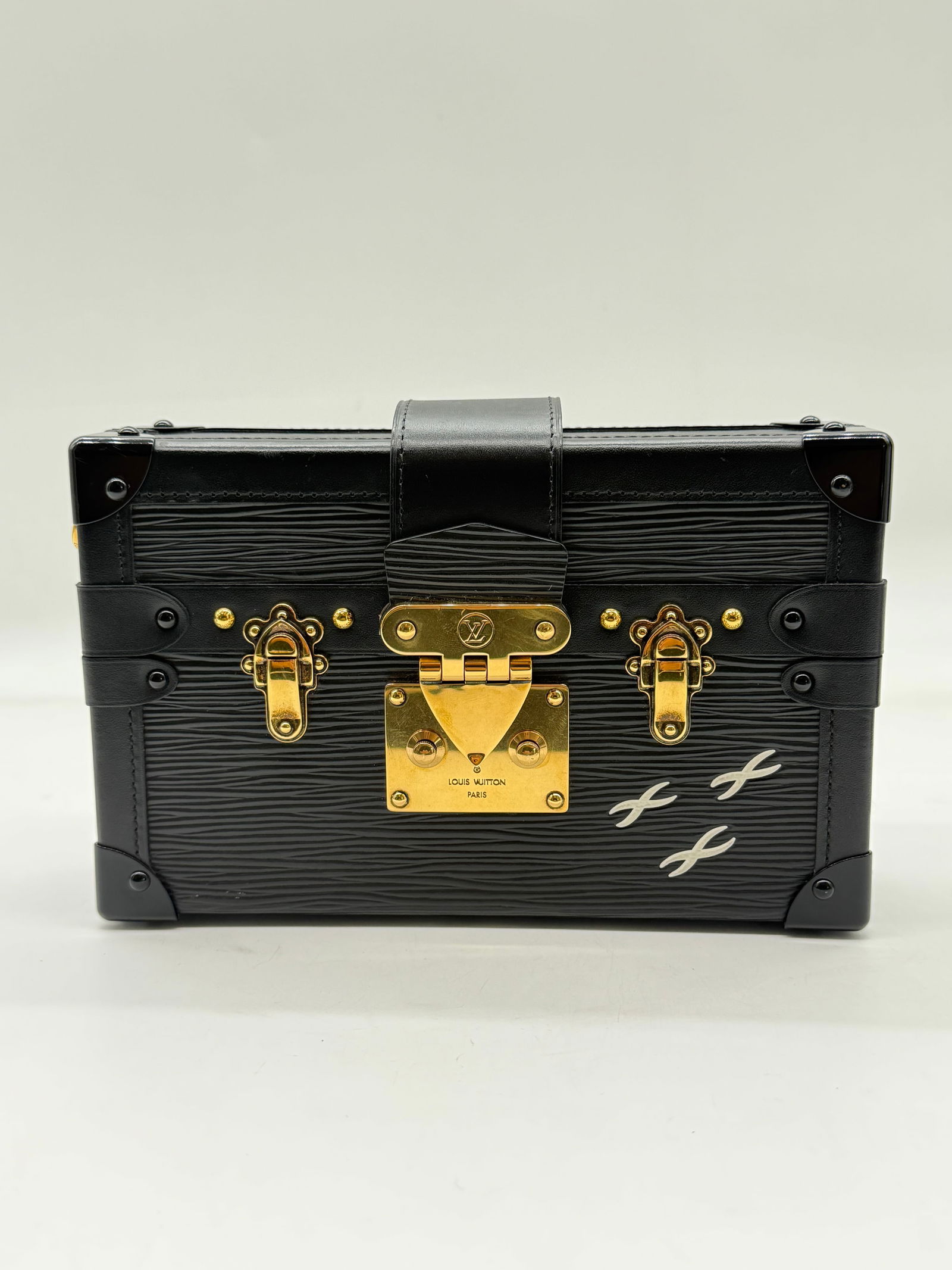 Louis Vuitton Petite Malle Epi Leather Trunk Bag – Black with Gold Hardware: Elegant and structured Louis Vuitton Petite Malle crafted in textured black Epi leather, inspired by the House’s iconic travel trunks. Features signature gold-tone S-lock closure, reinforced leather