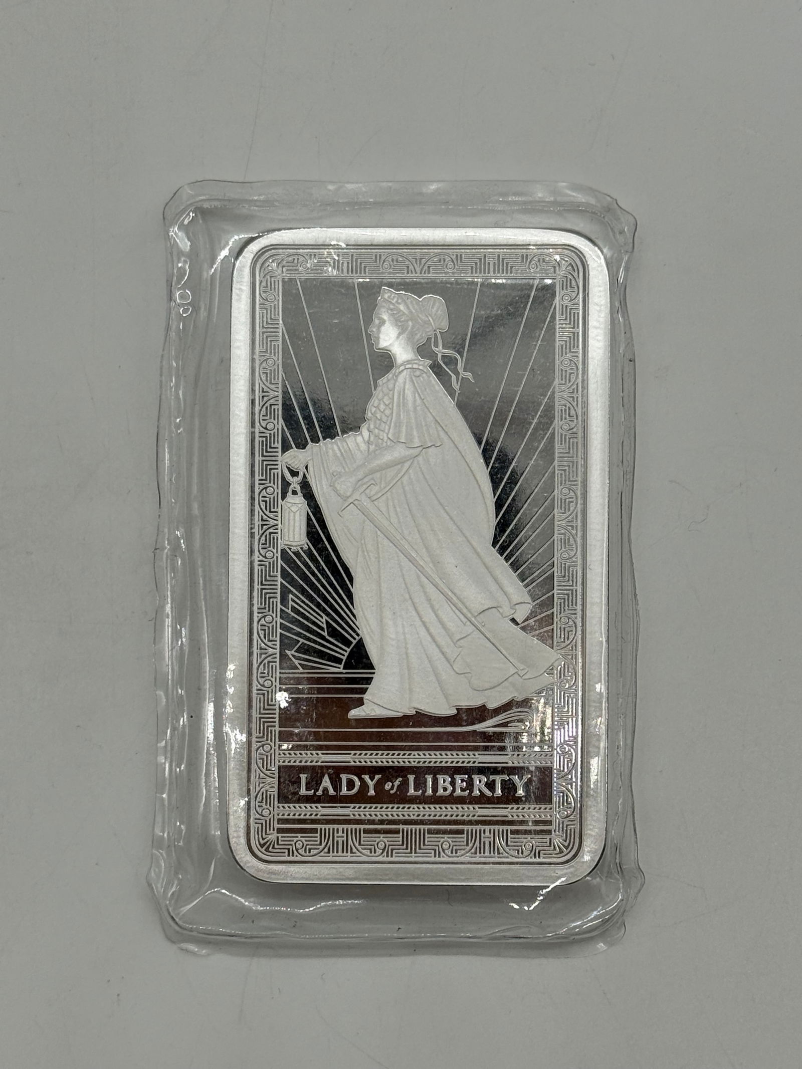 10 oz Pure Silver Lady of Liberty PAMP Bar (Sealed): Meet the 10 oz PAMP Suisse Silver Lady Liberty Bar, a masterpiece of numismatic art and quality craftsmanship. Revered for its exquisite Lady of Liberty design, this bar is a testament to PAMP's dedic
