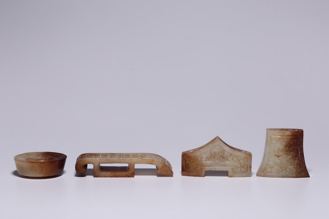 A set of war Han Hetian white jade with Qin beast face pattern sword ornament in a group of four (1 of 9)
