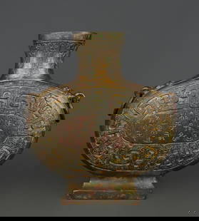 A Western Zhou bronze inscription flat jug: Western Zhou Dynasty bronze inscription flat pot Size:W:1100g L:17cm H:19cm (The Dimensions Of All Batches Are Manually Measured.If You Need More Detailed Information, Please Contact Our Customer Serv
