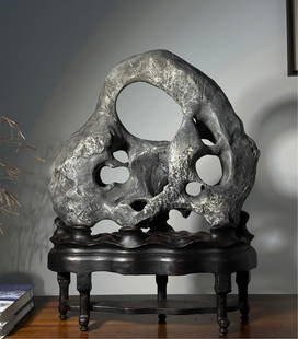 A piece of Qing Dynasty Taihu stone: Qing Dynasty Taihu stone Size:H:64cm W:52cm T:17cm (The Dimensions Of All Batches Are Manually Measured.If You Need More Detailed Information, Please Contact Our Customer Service Before Bidding.)