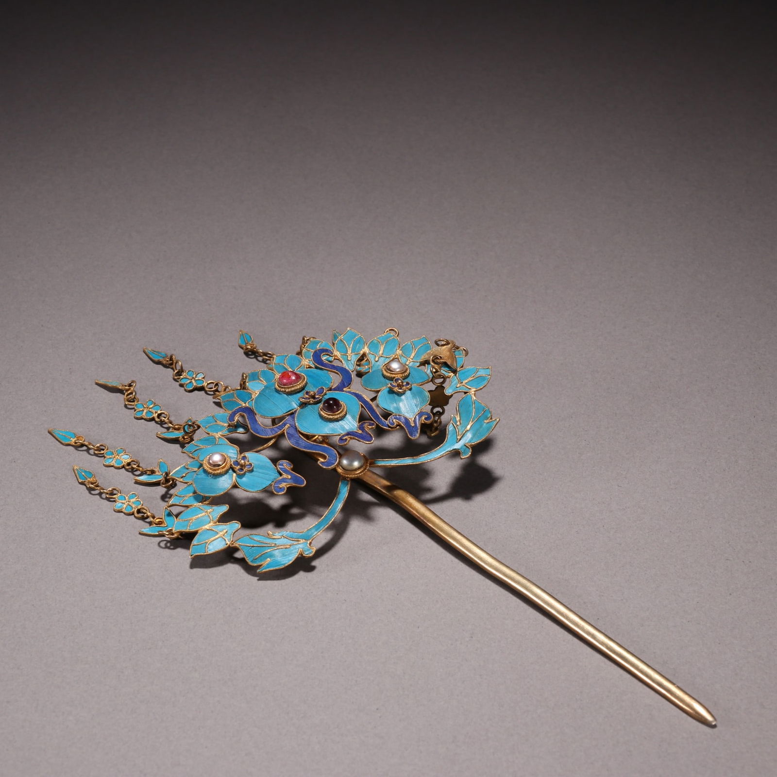 A Qing Dynasty silver-gilt dotted emerald inlaid gemstone hairpin (1 of 9)