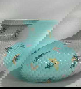 A piece of turquoise green glaze pastel butterfly pattern melon Ling flat belly of the Qing Dynasty: Qing Dynasty turquoise green glaze pastel butterfly pattern melon Ling flat belly respect one Size:H:35cm Belly D:44cm (The Dimensions Of All Batches Are Manually Measured.If You Need More