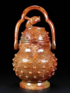 A Han Dynasty Hetian jade beam bottle: Han Dynasty Hetian jade tiliang bottle L:12cm W:12cm H:19cm W:1004g (The Dimensions Of All Batches Are Manually Measured.If You Need More Detailed Information, Please Contact Our Customer Service Befo