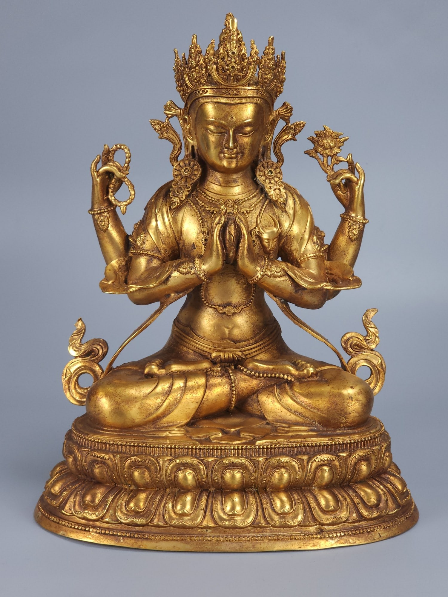 A Qing Dynasty bronze gilt four-armed Guanyin (1 of 8)