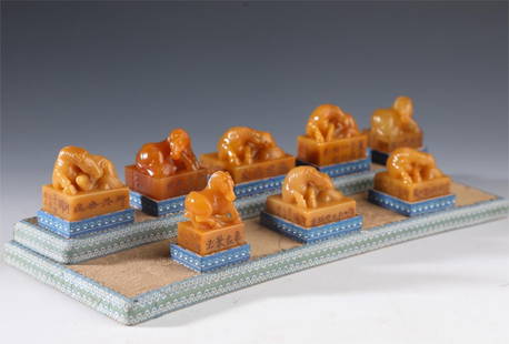 A set of Qing Dynasty Shoushan Tian Huangshi carved eight horse seals: The Qing Dynasty's Shou Shan Tian Huang stone carved eight horse seals Size: W:625g H:3.5cm W:5cm (The Dimensions Of All Batches Are Manually Measured.If You Need More Detailed Information, Please Con