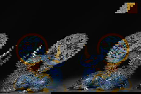 A pair of Qing Dynasty precision-cast copper cloisonné cloisonné enamel rhinoceros moon: Qing Dynasty Precision Cast Copper Cloisonné Filigree Enamel Rhino Moon Insert A Pair of [Style] Qianlong Year System [Details] The interstitial screen is a small screen displayed on the desk of the