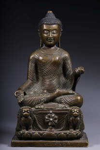 A seated statue of Baosheng Buddha in alloy copper and silver inlaid in the Qing Dynasty: Qing Dynasty alloy copper inlaid silver Baosheng Buddha seated statue Size: H:20cm L:11cm W:7.6cm W:1356g (The Dimensions Of All Batches Are Manually Measured.If You Need More Detailed Information, Pl