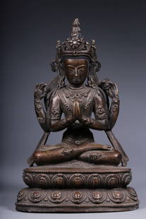 A bronze seated statue of four-armed Guanyin from the Qing Dynasty: A bronze seated statue of the four-armed Guanyin of the Qing Dynasty Size: H:14.5cm L:9.5cm W:6cm W:562g (The Dimensions Of All Batches Are Manually Measured.If You Need More Detailed Information, Ple