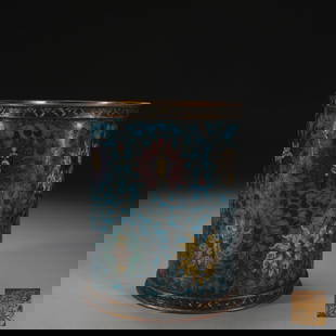 A piece of Ming copper cloisonné cloisonné enamel entangled lotus pattern pen holder: Ming copper cloisonné cloisonné enamel entwined branch lotus pattern pen holder [style] cloisonne year system [details] This pen holder copper tire flat barrel body upright. The edge of the mouth an