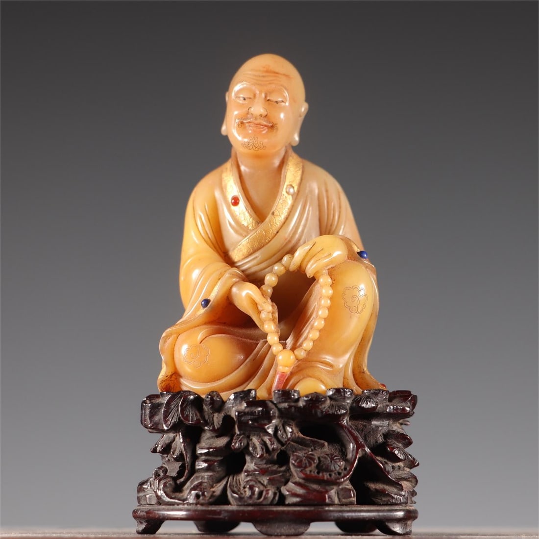 A piece of Shoushan stone inlaid with a rosewood base of a treasure arhat statue: Shoushan stone inlaid treasure arhat statue rosewood base Size: 5.8x4.2x11cm W:145g (The Dimensions Of All Batches Are Manually Measured.If You Need More Detailed Information, Please Contact Our Custo