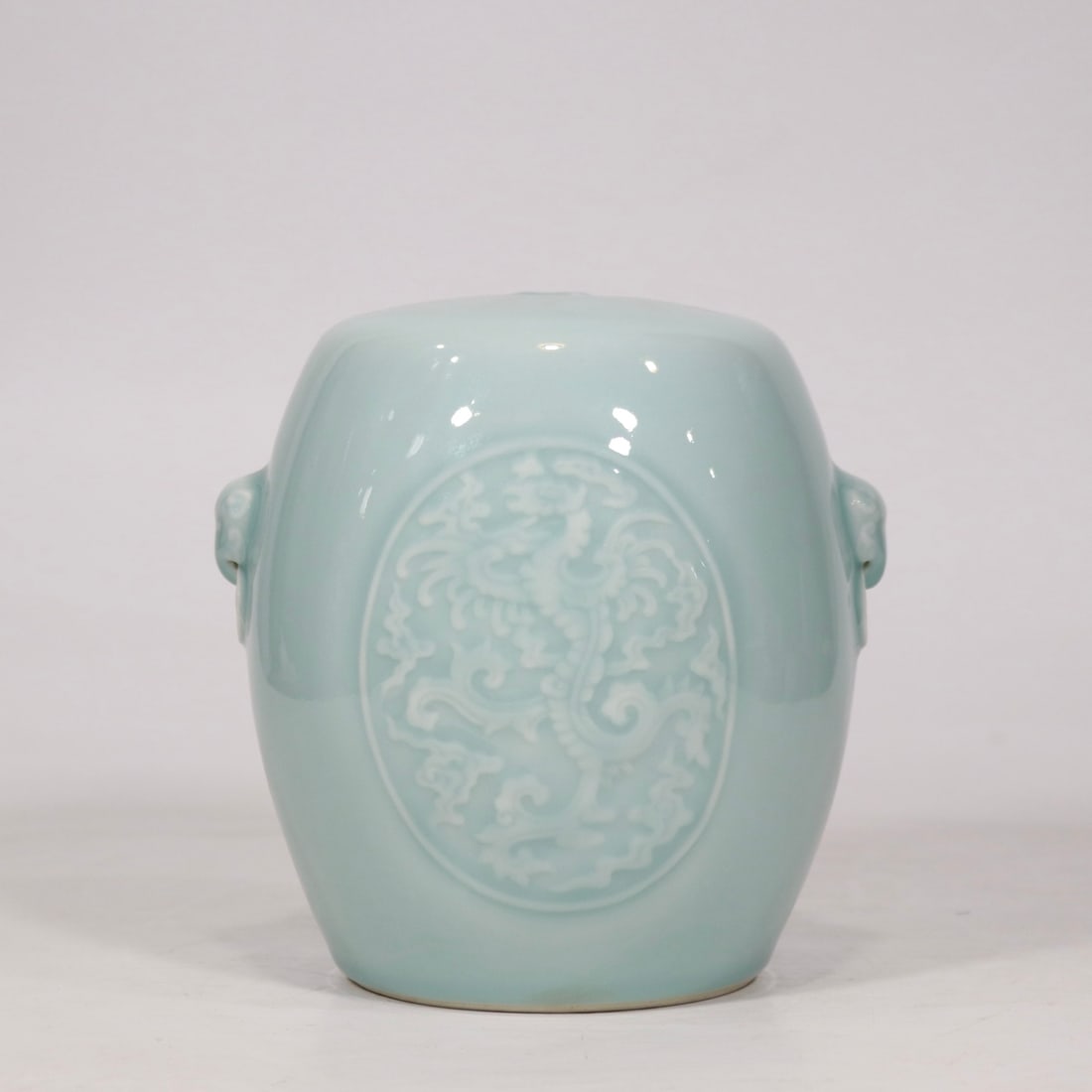 A pink blue glaze carved phoenix pattern amphora made in the Qianlong period of the Qing Dynasty: The pink blue glaze carved group phoenix pattern amphora Xiudun made in the Qianlong period of the Qing Dynasty SIZE: H:16cm Belly D:W:13.5cm (The Dimensions Of All Batches Are Manually Measured.If Yo