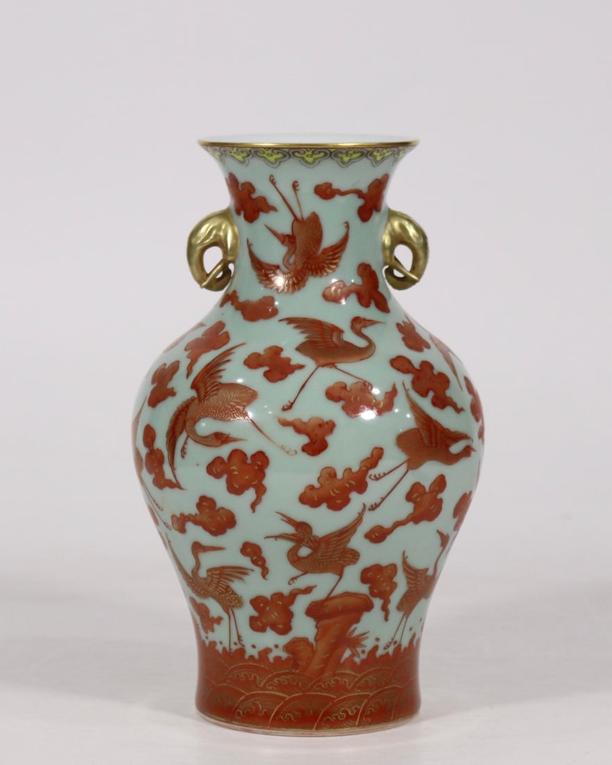 A bean blue glaze alum red gilded cloud crane pattern amphora made in the Qianlong period of the: Qing Dynasty Qianlong year bean blue glazed alum red gold-painted cloud crane pattern amphora SIZE: H:22cm Belly D:W:12.5cm (The Dimensions Of All Batches Are Manually Measured.If You Need More Detail