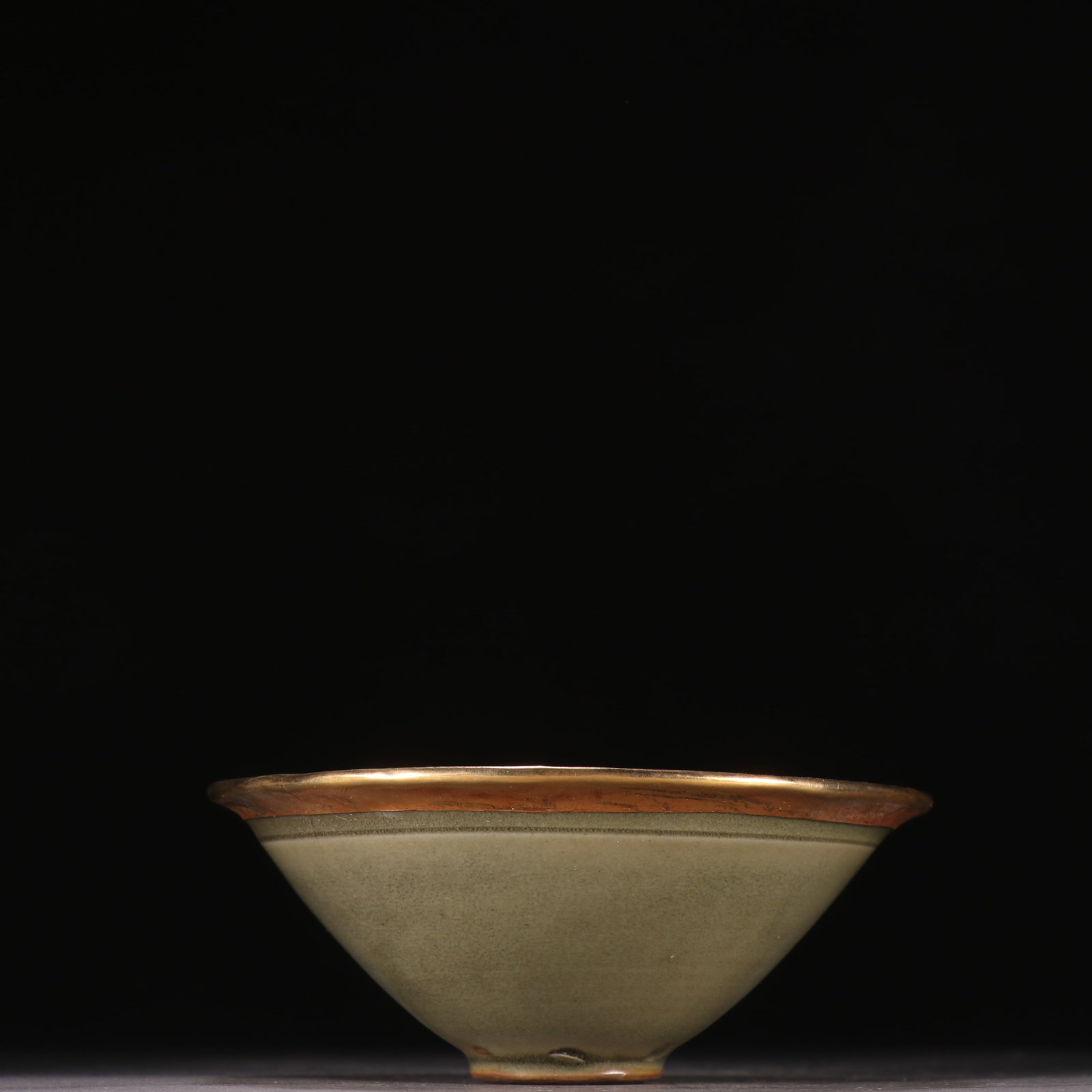 A Song Yaozhou kiln carved flower and bird pattern tea cup: Song Yaozhou kiln carved flower and bird pattern tea cup SIZE: H:4.2cm W:10.1cm (The Dimensions Of All Batches Are Manually Measured.If You Need More Detailed Information, Please Contact Our Customer