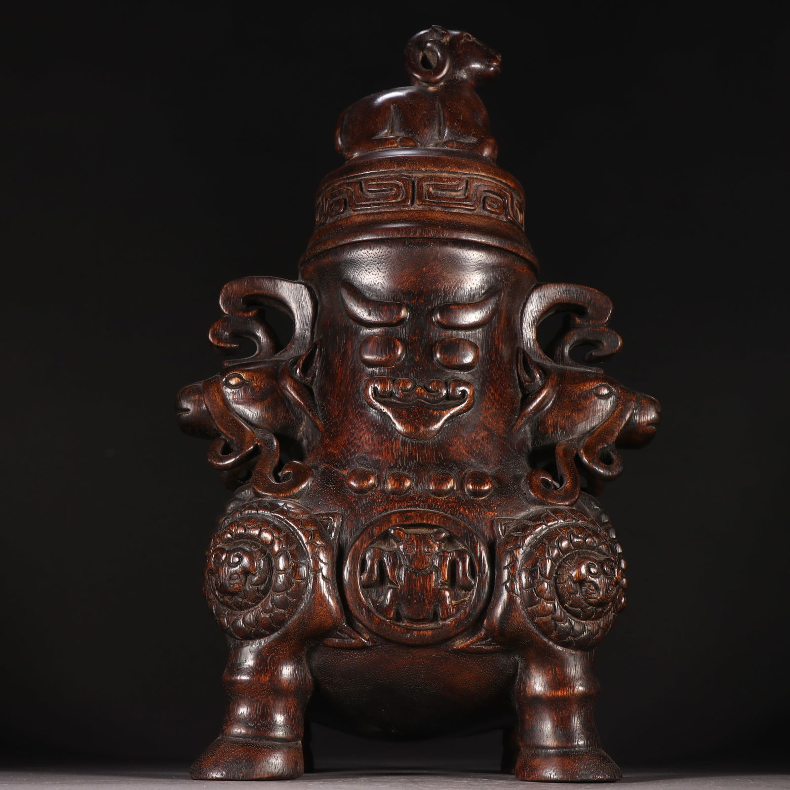 A Qing Dynasty agarwood amphora bullhead: Qing Dynasty Agarwood Amphora Niutou SIZE: H:30.5cm W:19.7cm W:507.9g (The Dimensions Of All Batches Are Manually Measured.If You Need More Detailed Information, Please Contact Our Customer Service Be