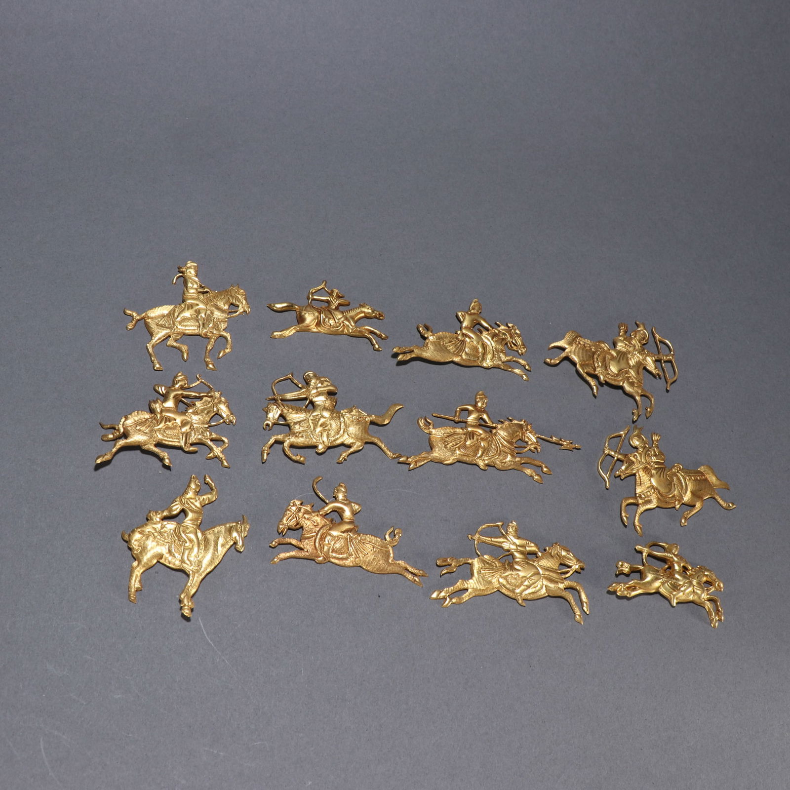 A set of Liao gold silver gilt cavalry carvings (1 of 9)