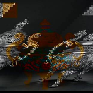 An Exquisite Cloisonne Lotus Pattern Bats and Peach Pattern Dragon Pattern Double-Ears and Tripod: An Exquisite Cloisonne Lotus Pattern Bats and Peach Pattern Dragon Pattern Double-Ears and Tripod Censer Qing Dynasty, China Qianlong Four-character Mark ?32cmx23cmx28cm Weight:7kg (The Dimensions Of