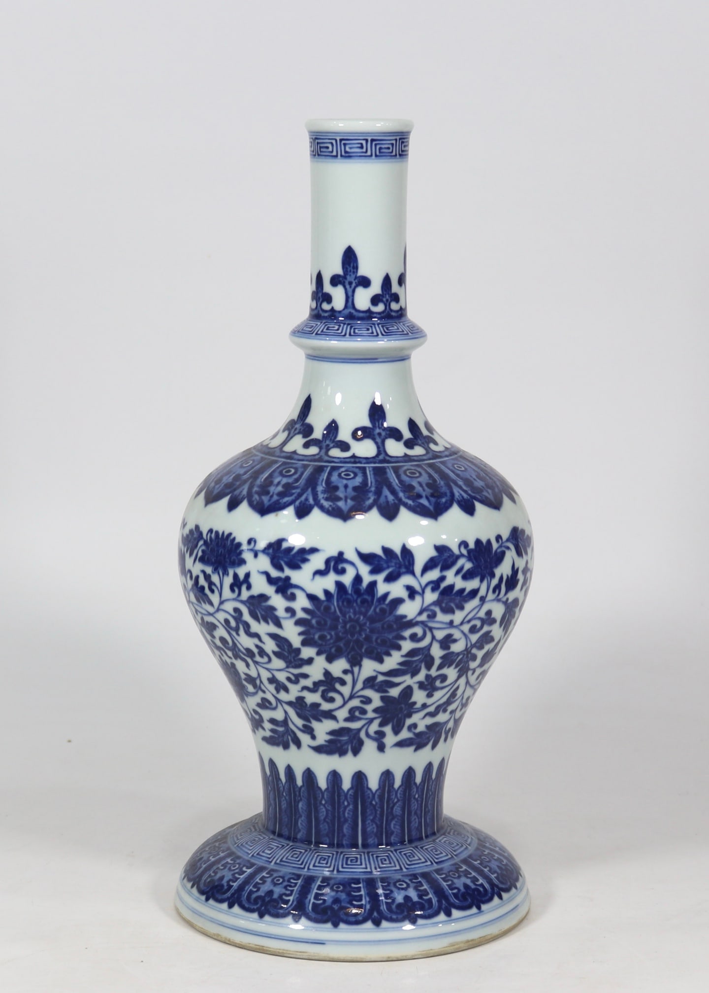 A blue and white entwined flower candlestick made in the Qianlong period of the Qing Dynasty: Qing Dynasty Qianlong year blue and white entwined flower candlestick SIZE: H:37cm bottomD:17.5cm (The Dimensions Of All Batches Are Manually Measured.If You Need More Detailed Information, Please Con