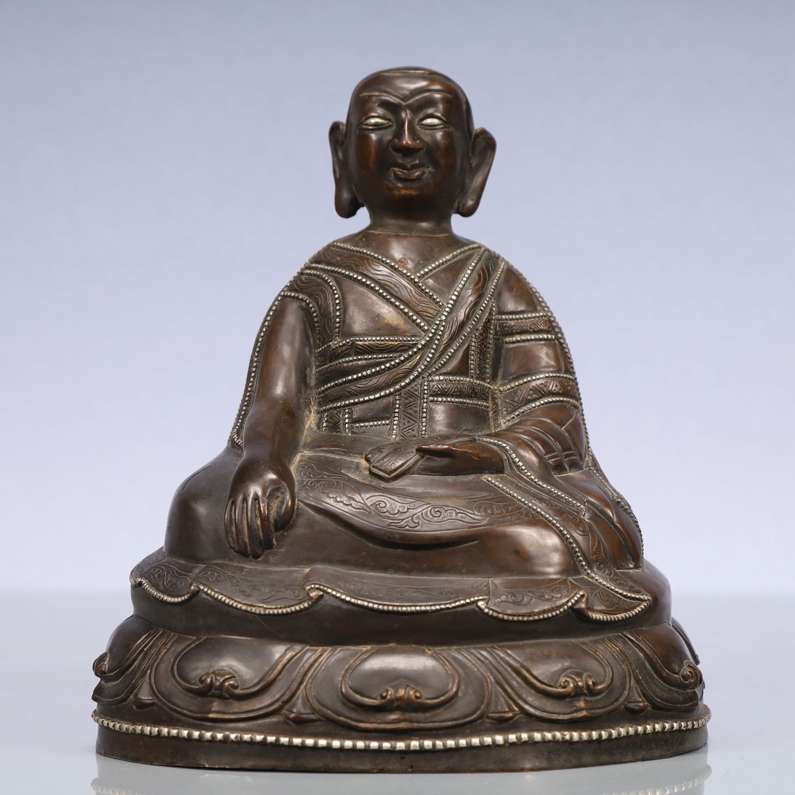 An Exquisite Bronze Inlaid Silver Statue of Guru (1 of 9)