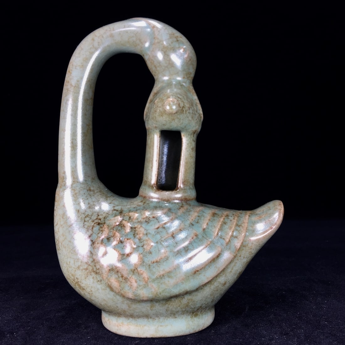 An Exquisite Ru yao Duck-Shaped Candlestick: An Exquisite Ru yao Duck-Shaped Candlestick Song Dynasty, China Size:13.5cmx19cm (The Dimensions Of All Batches Are Manually Measured.If You Need More Detailed Information, Please Contact Our Customer