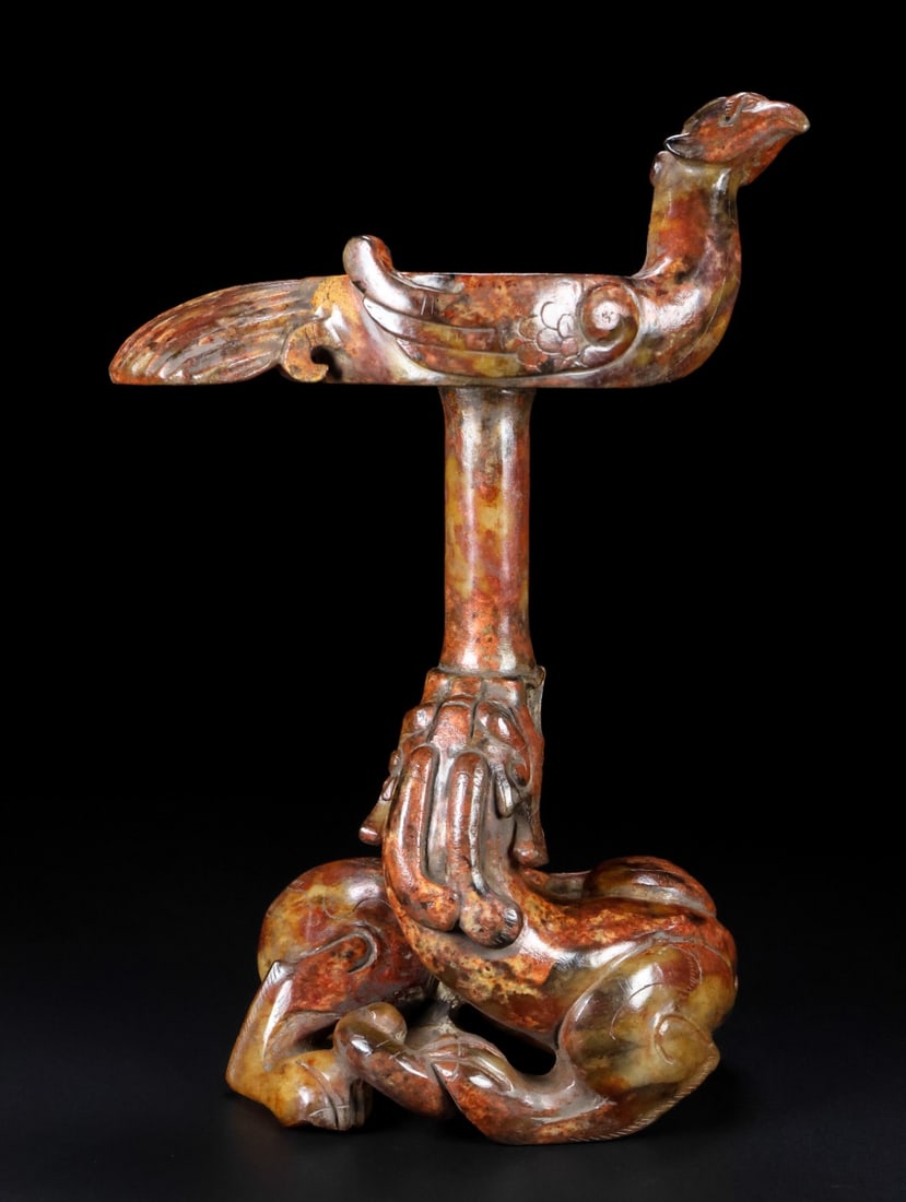 An Exquisite White Jade Dragon Phoenix-Shaped Candlestick: An Exquisite White Jade Dragon Phoenix-Shaped Candlestick Han Dynasty, China Size:22cmx14.8cmx9.4cm Weight:1.09kg (The Dimensions Of All Batches Are Manually Measured.If You Need More Detailed Informa