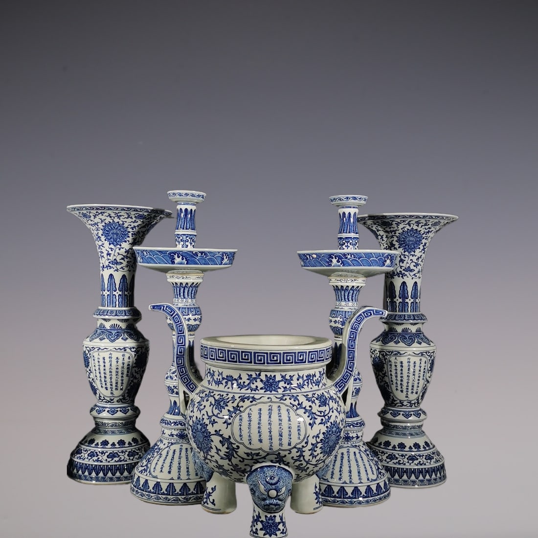 A Set of Fine Blue and White Lotus Pattern Lotus Pattern Seawater Pattern with poem Double-Ears and: A Set of Fine Blue and White Lotus Pattern Lotus Pattern Seawater Pattern with poem Double-Ears and Tripod Censer Candlestick Vase Qing Dynasty, China Size:63.6cmx25.8cm Size:66.4cm Size:42.5cm27cm (T