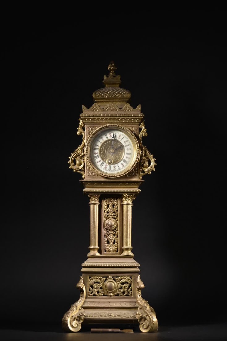 A bronze gilt bell tower-shaped table clock in the early 19th century French Rococo style (1 of 9)