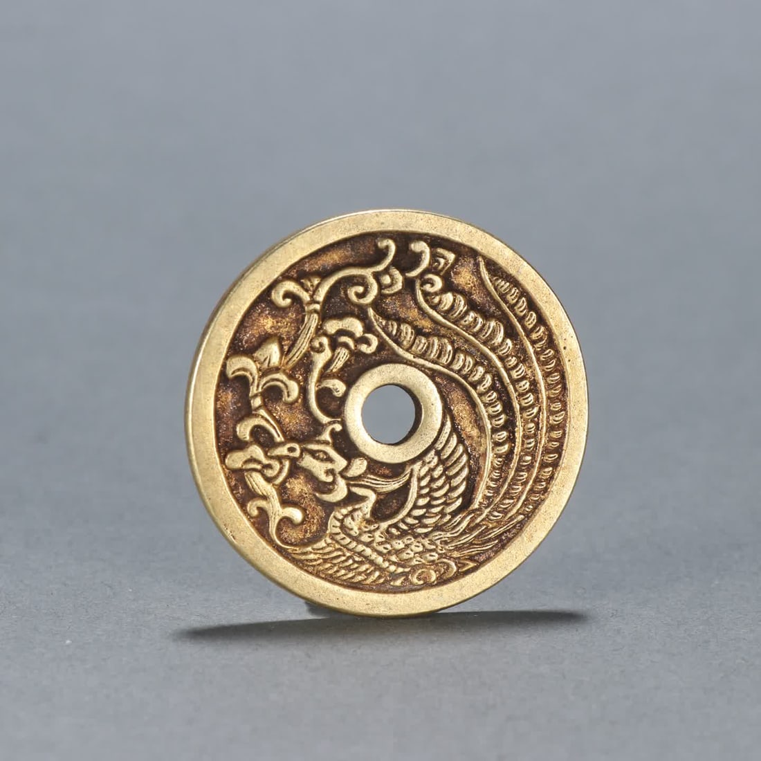 A copper-gilt phoenix pattern flower money (1 of 9)