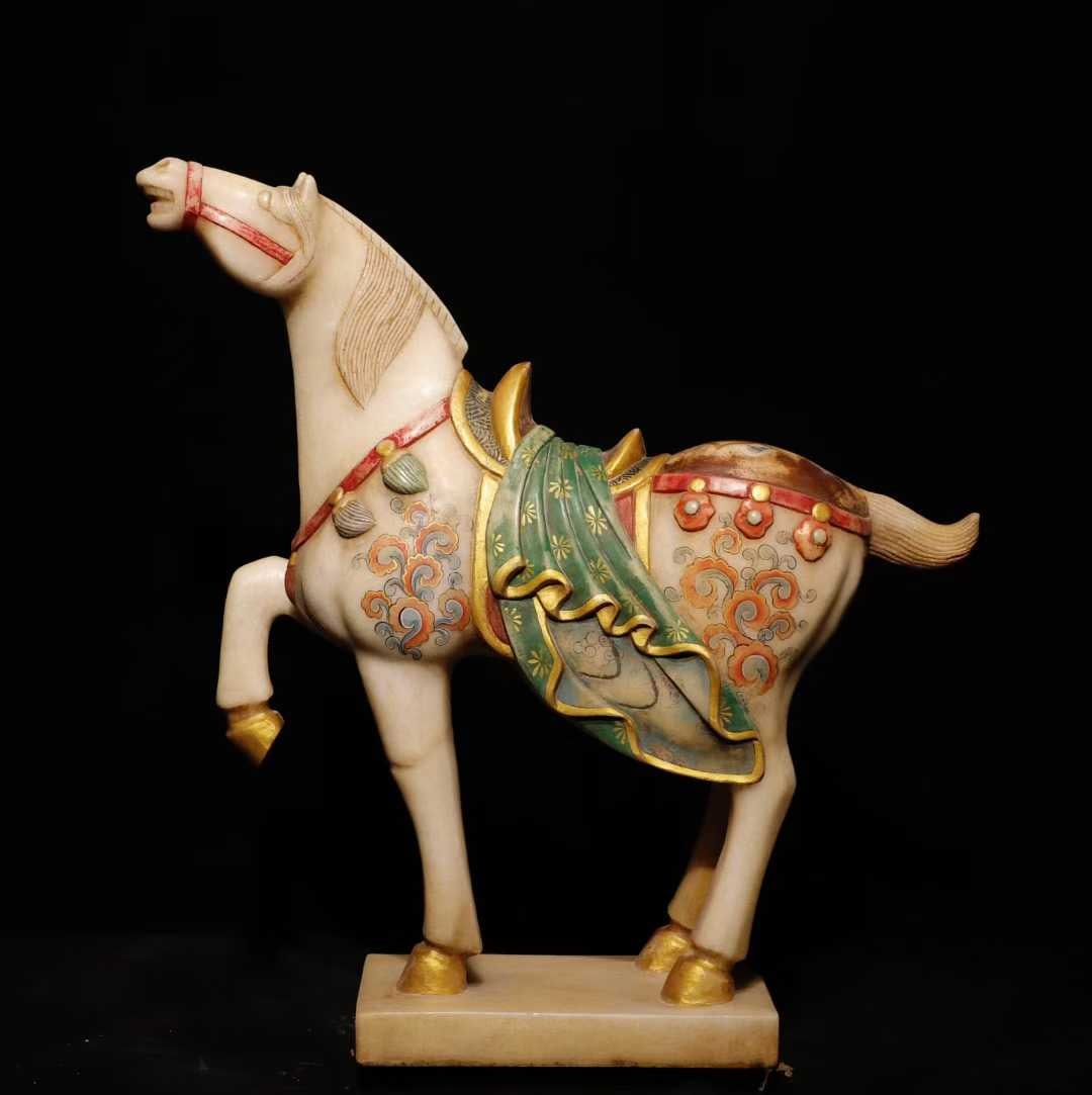 A Tang and Han white jade painted horse (1 of 6)
