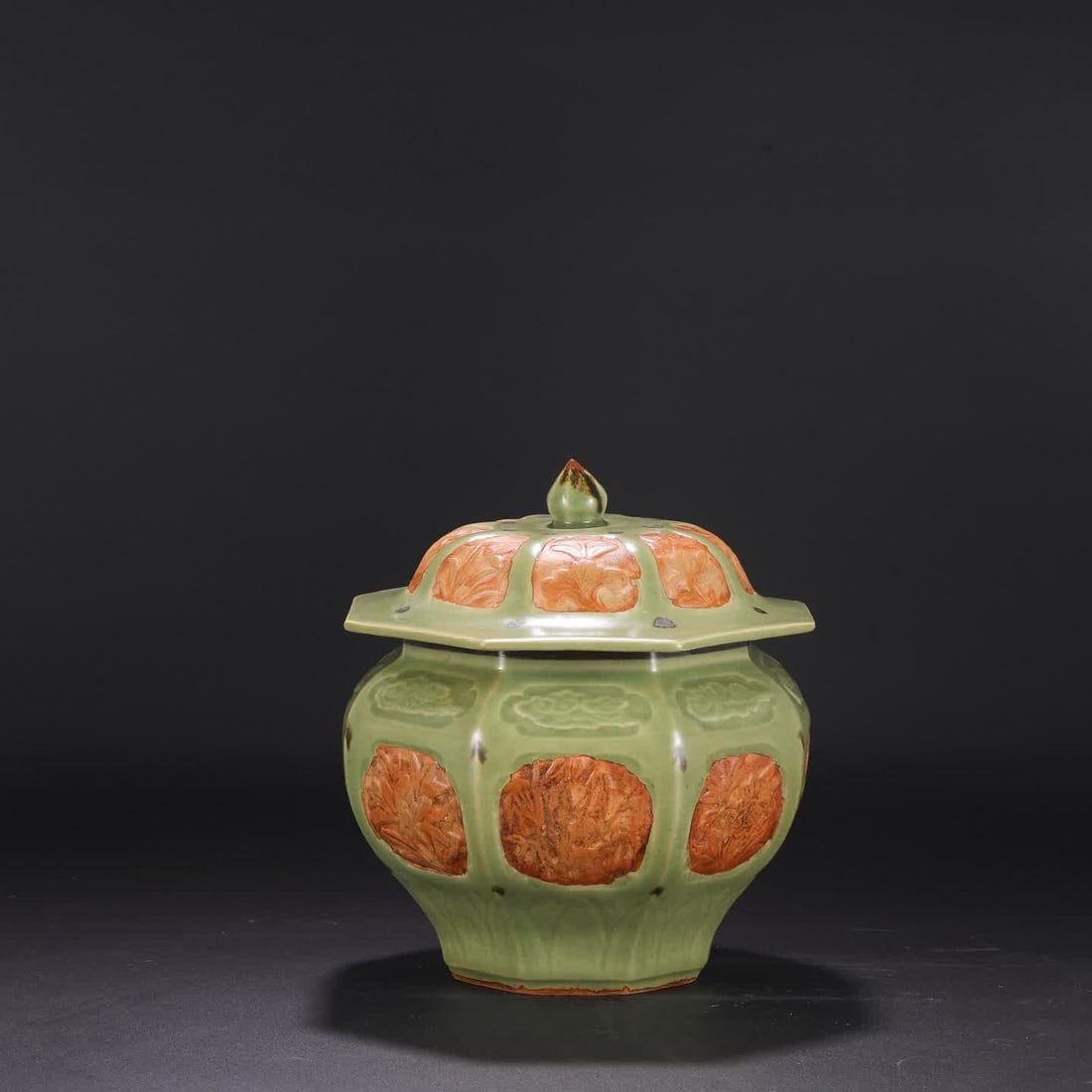 A Yuan Dynasty Longquan kiln celadon point color open window exposed tire floral pattern inlaid with: Yuan Dynasty Longquan kiln celadon point color open window exposed tire flower pattern inlaid with silver mouth eight square lid jars SIZE: H:29cm MouthD:19cm D:24cm (The Dimensions Of All Batches Are